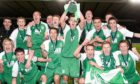 Callum Booth - standing, far right - and David Wotherspoon - standing, second from the left - celebrate the Hibs Scottish Youth Cup win.