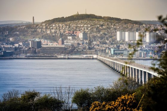 The Evening Telegraph, CR0008164, News, Dundee looking nice and picturesque in the sunshine to accompany a story on Dundee topping the list of best places to live. Picture shows; Dundee City showing the Stack, the Law and The Tay Road Bridge, from a viewpoint in Tayport. Thursday 11th April, 2019. Mhairi Edwards/DCT Media