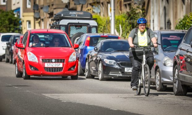 A commuter on an e-bike.