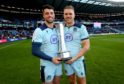 Chris Harris (r, with Adam Hastings) is looking to celebrate with The Auld Alliance trophy again.
Guinness 6 Nations Round 4, BT Murrayfield, Edinburgh, Scotland - 08 Mar 2020