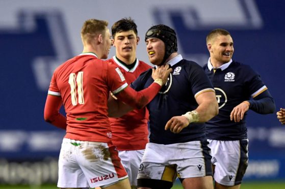 Zander Fagerson and Liam Williams have a confrontation at Murrayfield.