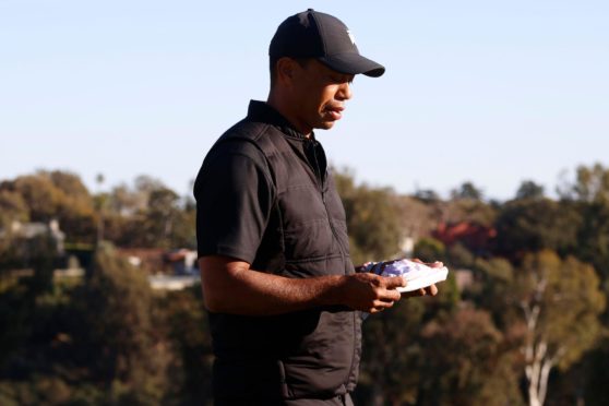 Tiger Woods at the presentation ceremony for the Genesis Invitational on Sunday.