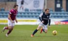Paul McMullan takes on Arbroath for Dundee.