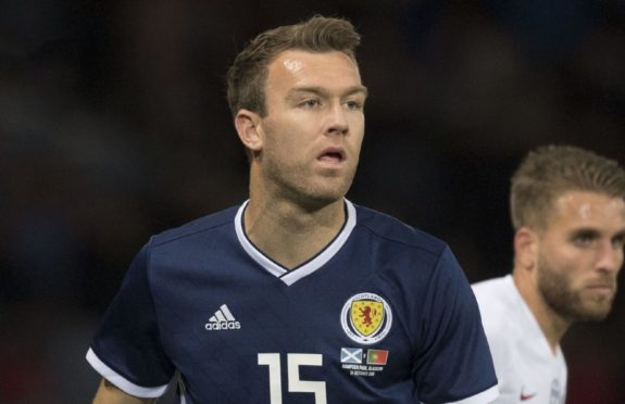 Kevin McDonald in action for Scotland against Portugal in 2018.