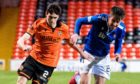 Dundee United right-back Liam Smith takes on St Johnstone's Callum Booth earlier in the season.