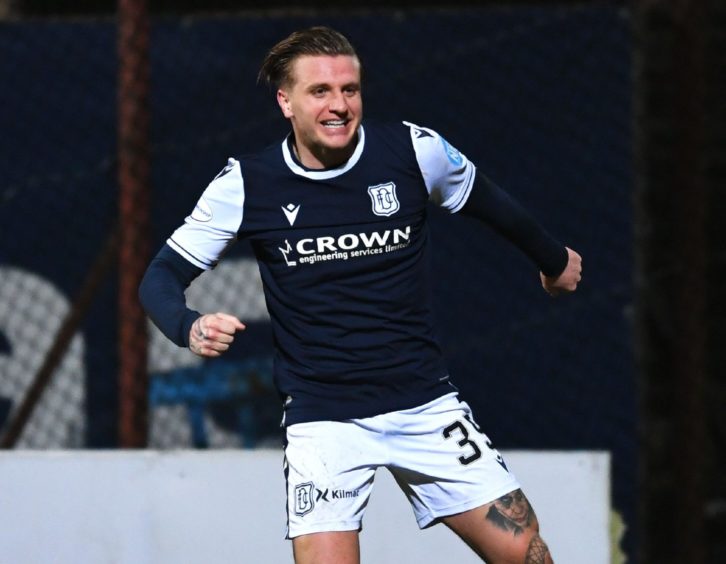 Cummings celebrates a goal for Dundee