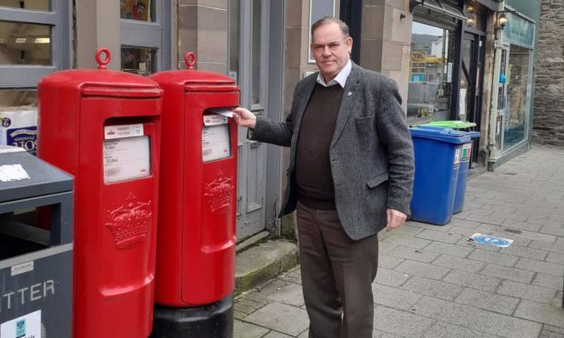 Councillor John Duff, pictured outside the sorting office in Aberfeldy