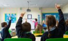 More than £3 million of money earmarked to improve the academic performance of disadvantaged children in Dundee has not been spent,