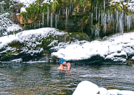 Calum Maclean takes a break from life's stresses in a local river.