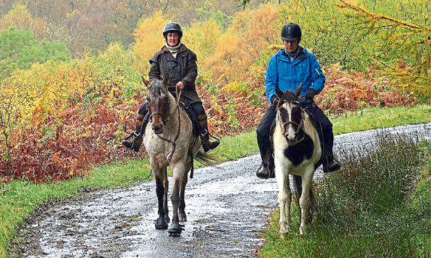 Perthshire horse rider Karen Inkster on Monty and Paul Murton on Connie.