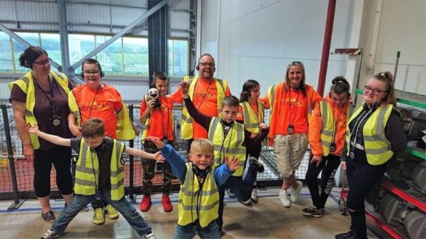 Hyperclub children and carers during a visit to Amazon in Dunfermline..