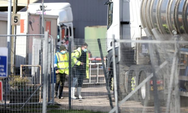 Lorries getting hosed down at the 2 Sisters factory in Coupar Angus on Wednesday morning