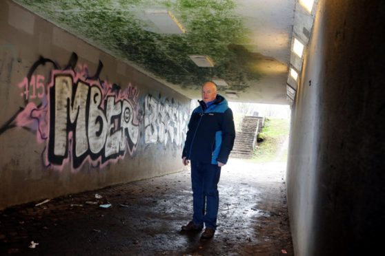 Kevin Keenan said the graffiti-covered under pass must be cleaned.