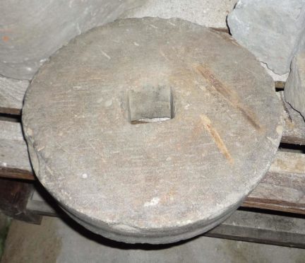 Police say it would have taken at least two people to lift the stone.