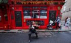 World renowned fiddler Frankie Gavin performs a lament marking exactly 1 year to the day that Dublin's Temple Bar Area closed down. Picture date: Monday March 15, 2021. PA Photo. See PA story IRISH Coronavirus Bars. Photo credit should read: Niall Carson/PA Wire