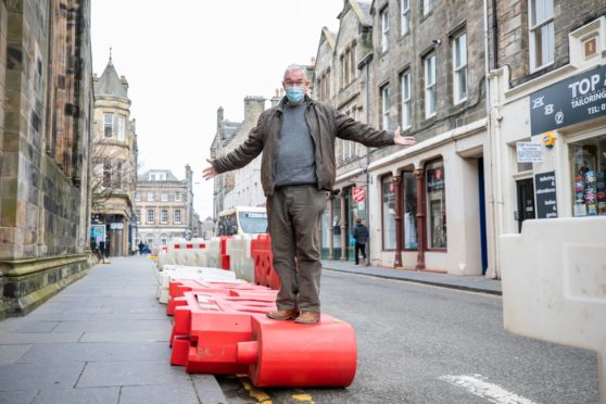 Eric Milne, from St Andrews bakers Fisher & Donaldson with the offending barriers.