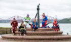 Courier News - Fife - Neil Henderson story - CR0022081 - local west Fife lockdown 'superheros' who will be running together through the streets of Dalgety Bay to entertain kids. Picture shows; the superheroes at the Anchor Monument - l to r - 'Flash' Geoff Nicholson, 'Batwoman' Carol Quoi,  'Buzz Lightyear' Andy Spence, 'Superwoman' Debbie Miller, 'Superwoman' Debbie Miller, 'Superman' Nick Green and  'Spiderman' Dave Roper, Harbour Drive, Dalgety Bay, 28th June 2020, Kim Cessford / DCT Media.