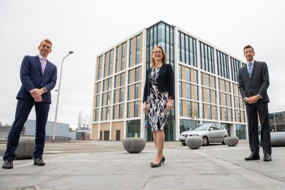 Shirley-Anne Somerville, John Alexander and David Wallace in front of the building when the Social Security Scotland lease was announced.