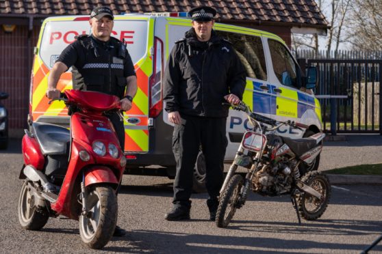 Sgt Paul Haigh and PC Gavin Howard of Downfield Police station are tackling the dangers of youths on motor bikes racing through city streets.