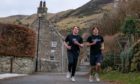 Sam Allen and his 17 year old friend Euan Hardie who are "climbing Everest" near their home in Kinneswood to raise cash to repair the crumbling Michael Bruce Cottage Museum.