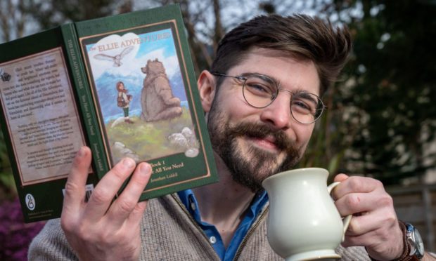 Johnathan Liddell with his book.