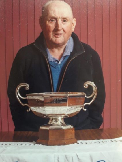 Keith with the Alyth Bowling and Tennis Club's League Cup winners' trophy.