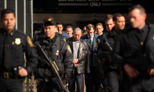 Members of the Gambino family including underboss Domenico Cefalu, centre, are transported from Manhattan to Brooklyn Federal Court by FBI agents on Thursday, February 7, 2008, in New York.