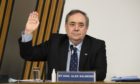 Former first minister Alex Salmond is sworn in before giving evidence to a Scottish Parliament committee examining the handling of harassment allegations him.