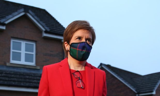 Nicola Sturgeon, leaves her home in Glasgow to head to Holyrood to give evidence to the Scottish Parliament's inquiry into her government's investigation of the former First Minister Alex Salmond.