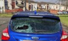 One of the damaged vehicles ia wave of anti-social behaviour and vandalism across Rosyth.