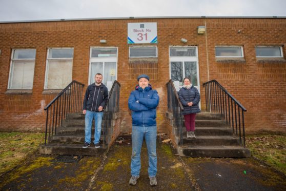 (Left to right) James Gallacher, his dad Gary Gallacher alongside Alison Walker (from the Lochee Community Group)