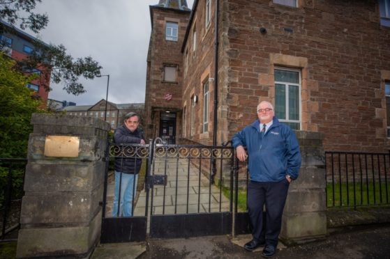 Sam Evans and Malcolm Page outside The Salvation Army's Strathmore Lodge.