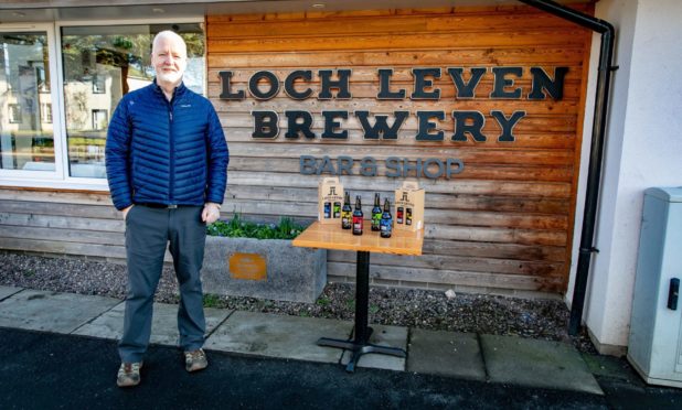 Thomas Moffat at Loch Leven Brewery with the new limited edition beer for sale to aid NatureScot