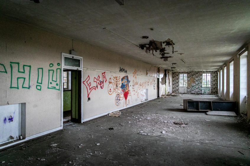 The crumbling interior of Strathmartine Hospital.