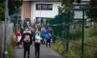 The car ban could see more children walking to school. Pictured is children walking to Blairgowrie Community Campus, last year.