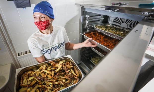 Signpost International's Caroline Bentley in the new community kitchen