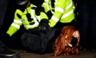 Patsy Stevenson is arrested on the bandstand of Clapham Common, where a vigil was taking place for Sarah Everard