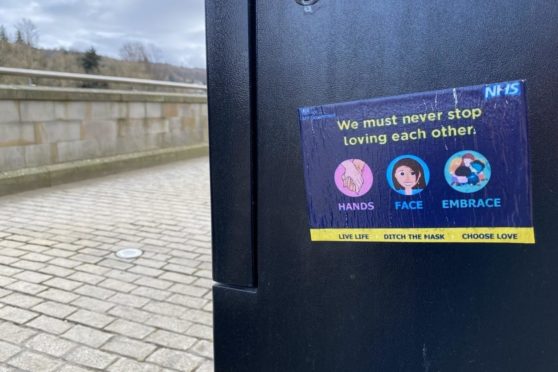 Stickers pushing an anti-vax message have appeared across Perth