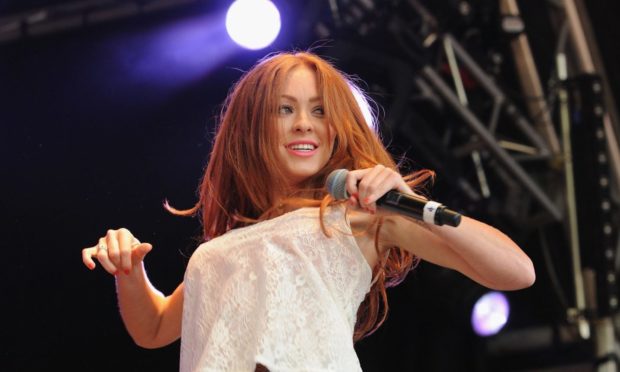ASCOT, ENGLAND - AUGUST 10:  Natasha Hamilton of Atomic Kitten performing at the Dubai Duty Free Shergar Cup and concert at Ascot Racecourse on August 10, 2013 in Ascot, England.  (Photo by Eamonn M. McCormack/Getty Images for Ascot Racecourse)