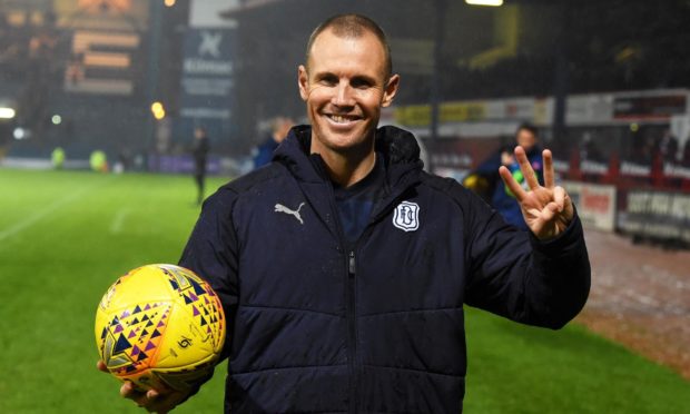 Kenny Miller goes home with a match ball