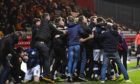 Raith Rovers players celebrate with supporters at Firhill