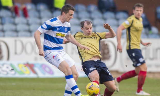 Morton's Stephen McGinn and Dundee's Paul McGowan in action.