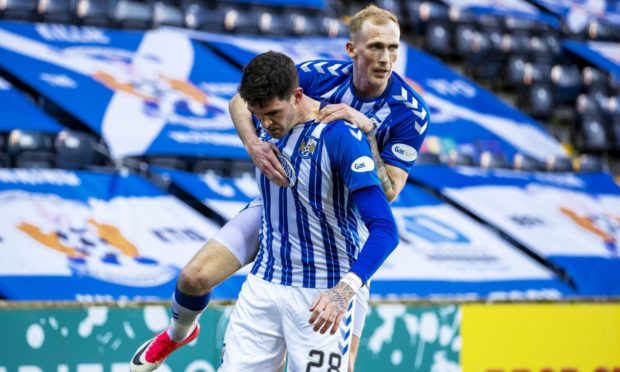 Hat-trick hero Kyle Lafferty is congratulated by Mitch Pinnock after bagging the opener.