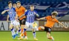 Dundee United youngsters Archie Meekison (right) and Louis Appere in action against Kilmarnock last night.
