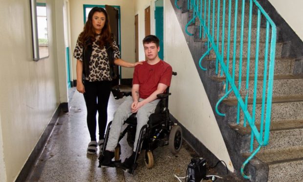 Erin Mullen and Ben Dryden at their flat in Arbroath.