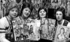 Rollers fans Liz Tosh, Gladys Wiseman, Linda Mann and Teresa Stewart who queued up all night in the pouring rain to have first choice of tickets for the Bay City Rollers concert at the Caird Hall in May 1975.