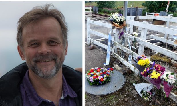 Chris Stuchbury's wife, Diane, has thanked those who supported her family after his death. Pictured: Floral tributes left at the Carmont signal box