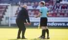 Dick Campbell remonstrates with match officials at East End Park.