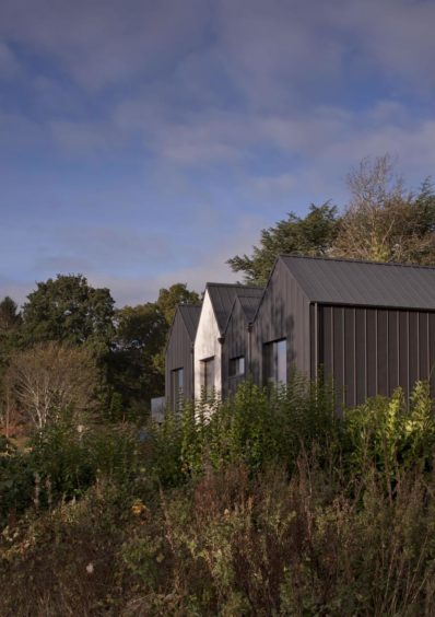 The Dundee Passivhaus sits in three acres of wooded grounds.