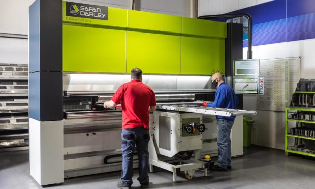 Fife Fabrications staff with the new press brake machine.